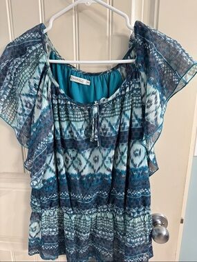Ricki’s Revolution Blue Teal Patterned Flutter Sleeve Blouse